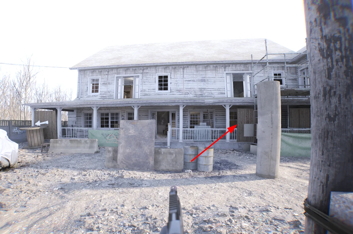 Worn House from the defender spawn, arrow pointing at a ground floor window.
